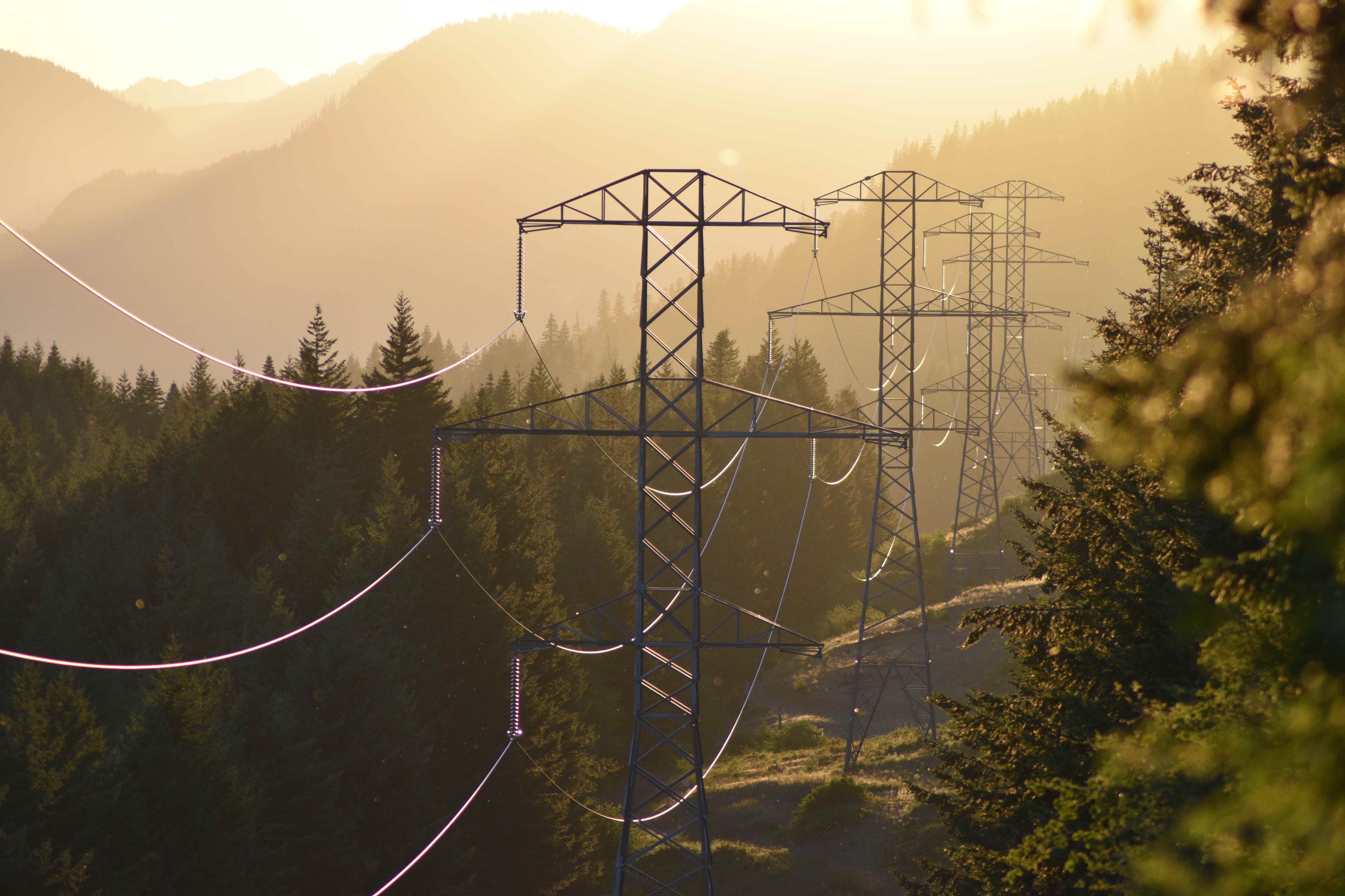 Power lines in a mountainous landscape