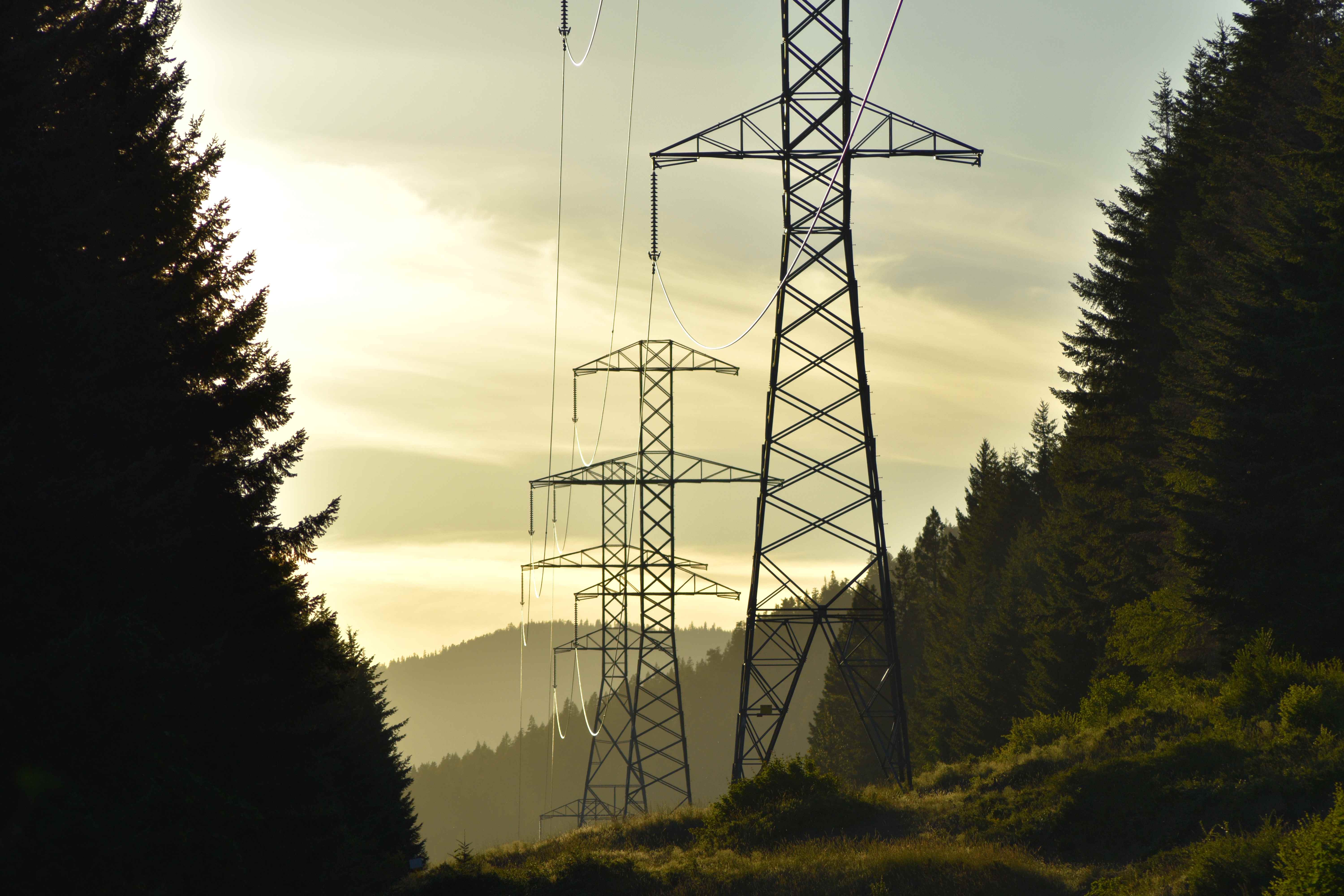 Power lines in a mountainous landscape